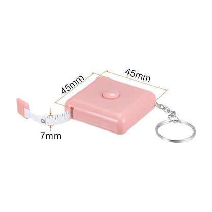 CINTA MÉTRICA CORPORAL RETRÁCTIL ROSA LLAVERO BOLSO CARTERA