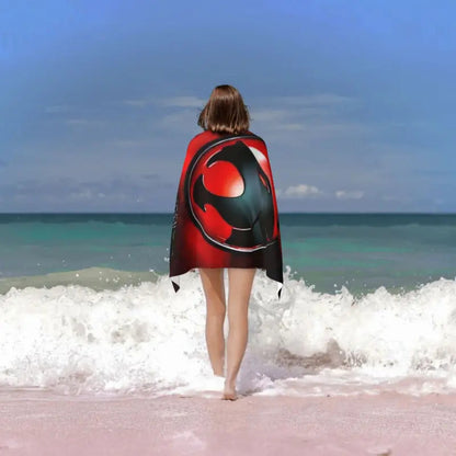 TOALLA PLAYA BAÑO LOGO THUNDERCATS 80X160 CMS NEGRO ROJO LOGO THUNDERCATS