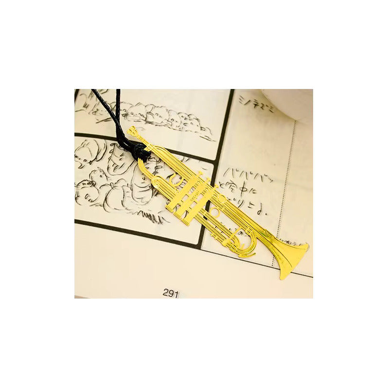 MARCAPÁGINAS TROMPETA LIBRO MÚSICA REVISTA NOTA PAPEL AGENDA DORADO TROMPETA