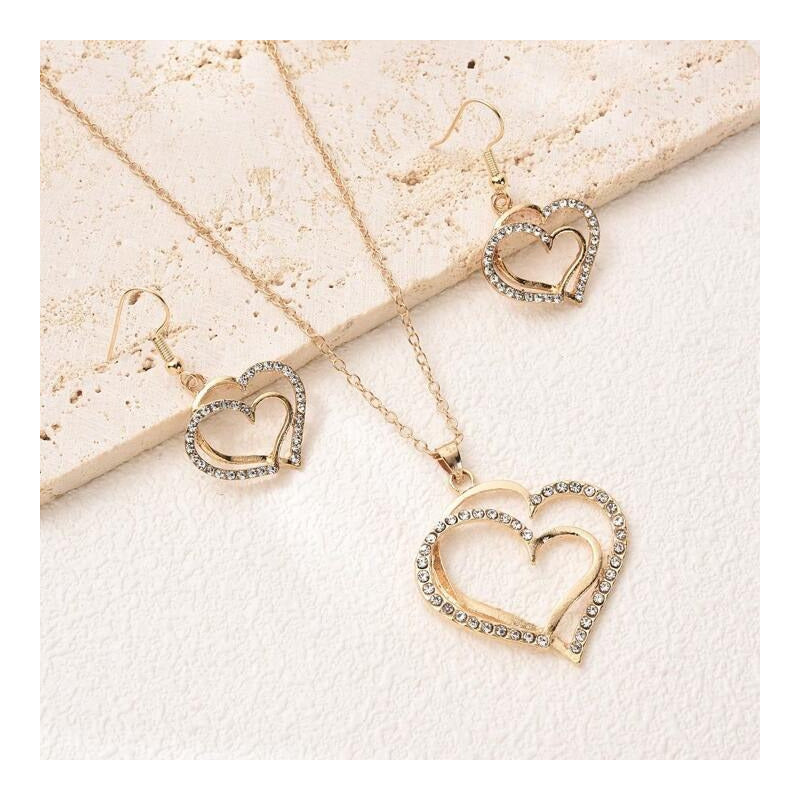 CONJUNTO CADENA Y ARETES DOBLE CORAZÓN DORADO INCRUSTACIONES LAVANDA