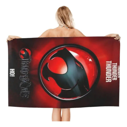 TOALLA PLAYA BAÑO LOGO THUNDERCATS 80X160 CMS NEGRO ROJO LOGO THUNDERCATS