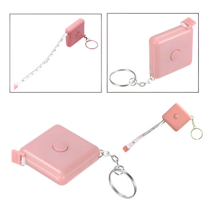 CINTA MÉTRICA CORPORAL RETRÁCTIL ROSA LLAVERO BOLSO CARTERA