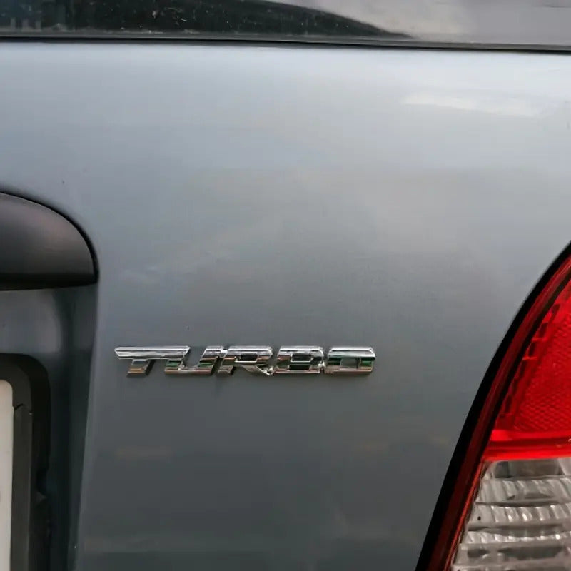 EMBLEMA TURBO METAL 3D ADHESIVO VEHÍCULO INSIGNIA CROMADO