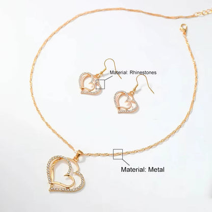 CONJUNTO CADENA Y ARETES DOBLE CORAZÓN DORADO INCRUSTACIONES LAVANDA