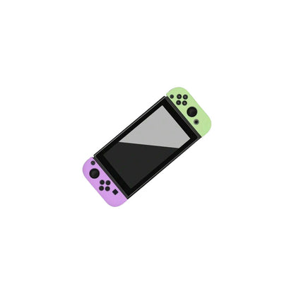 JUEGO PROTECTOR SILICONA CONTROL PARA NINTENDO SWITCH OLED VERDE / LILA | SILICONE CONTROLLER PROTECTOR SET FOR NINTENDO SWITCH OLED GREEN / PURPLE
