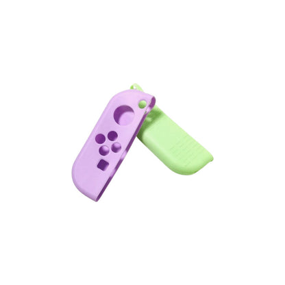 JUEGO PROTECTOR SILICONA CONTROL PARA NINTENDO SWITCH OLED VERDE / LILA | SILICONE CONTROLLER PROTECTOR SET FOR NINTENDO SWITCH OLED GREEN / PURPLE
