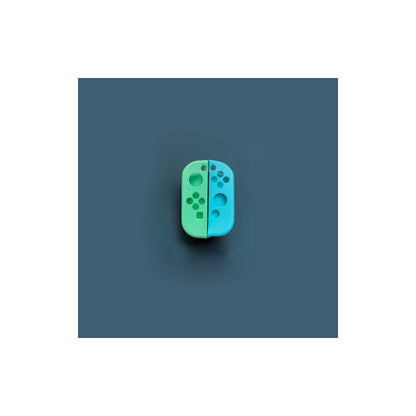 PROTECTOR SILICONA JOY-CON PARA NINTENDO SWITCH OLED VERDE/AZUL | SILICONE JOY-CON PROTECTOR FOR NINTENDO SWITCH OLED GREEN/BLUE
